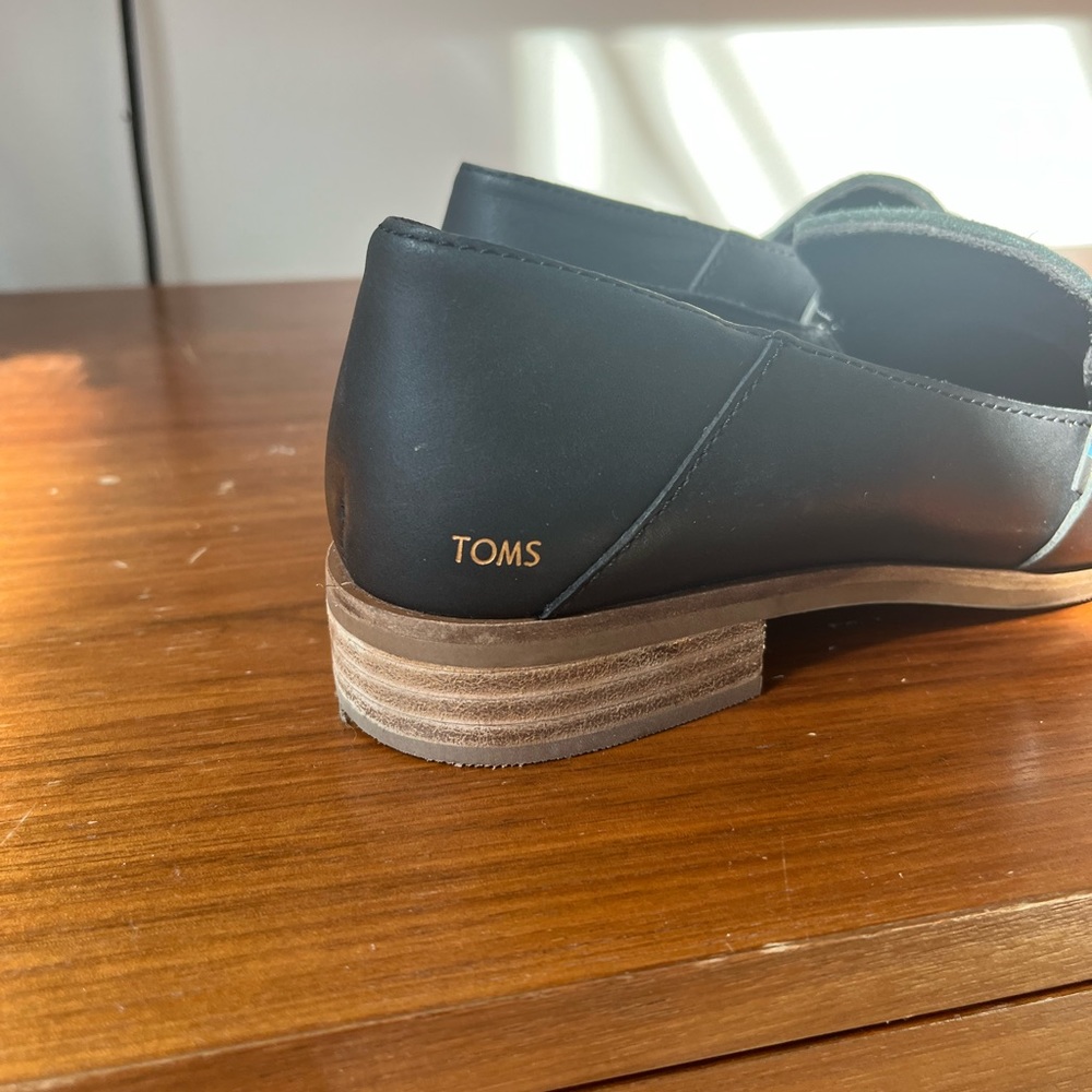 Brand new Toms loafers.
